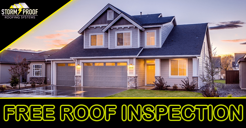 A photo of a roofer installing asphalt shingles on a roof.